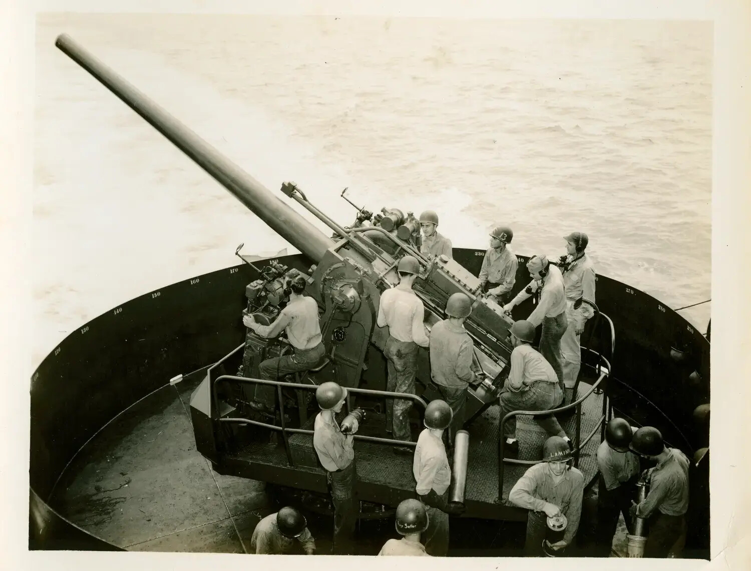5-Inch/38 Caliber Gun Crew at General Quarters Aboard USS Petrof Bay (CVE-80)