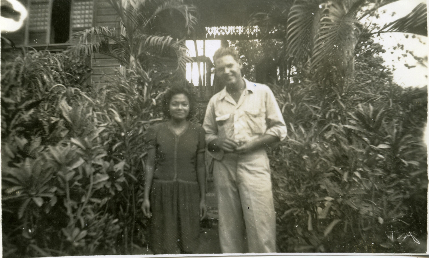 Serviceman and Local Woman in Tropical Garden, Pacific Theater, c. 1940s