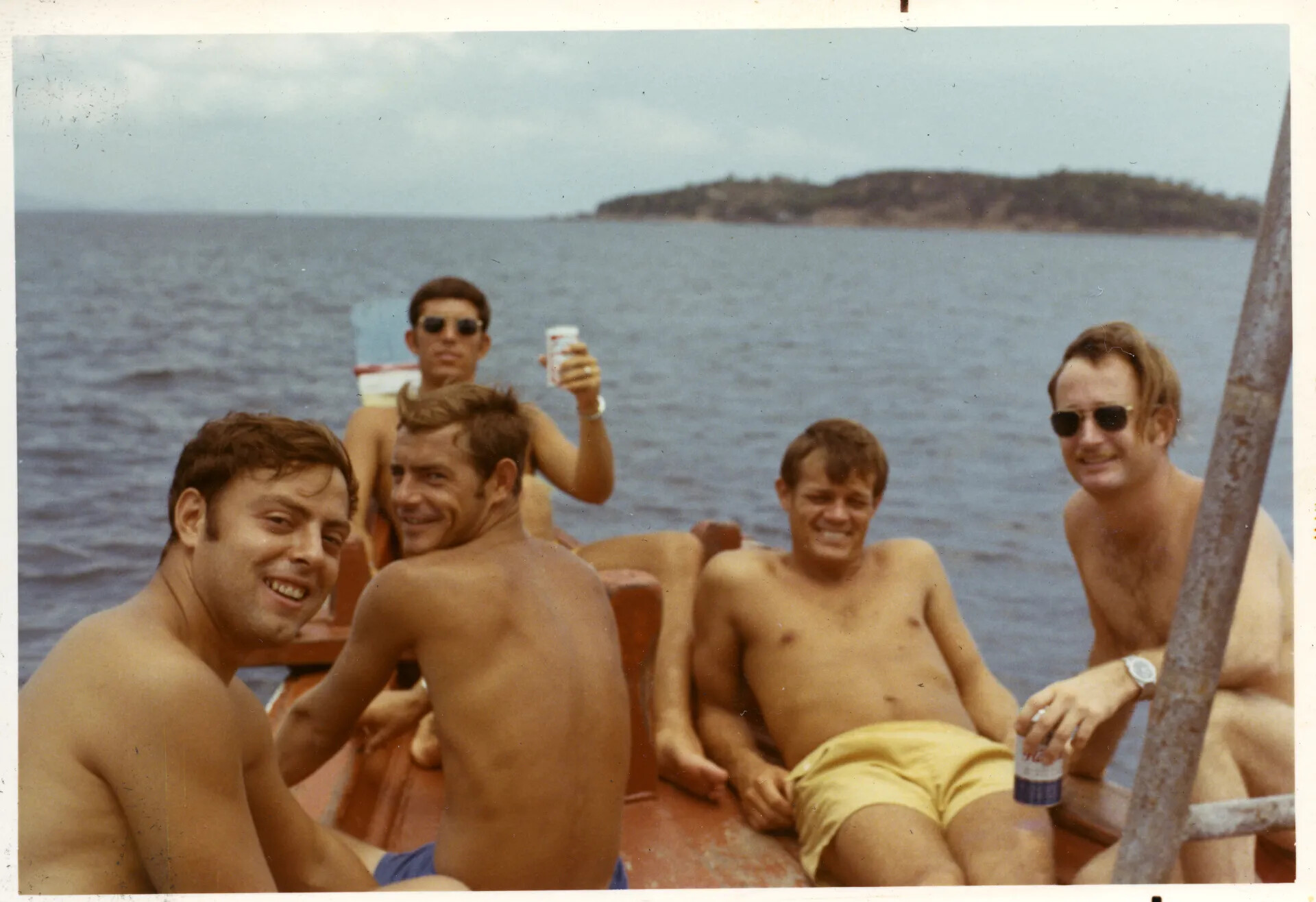 Airmen Relaxing on a Boat Outing Near Nakhon Phanom, Thailand — Doug Carmichael Collection, Vietnam Era