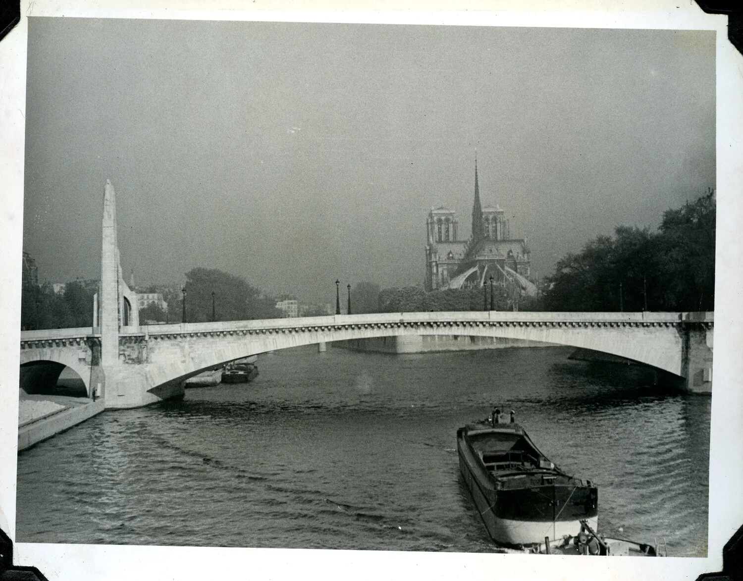 Notre-Dame Cathedral and the Seine River from Pont de la Tournelle, Paris, WWII Era