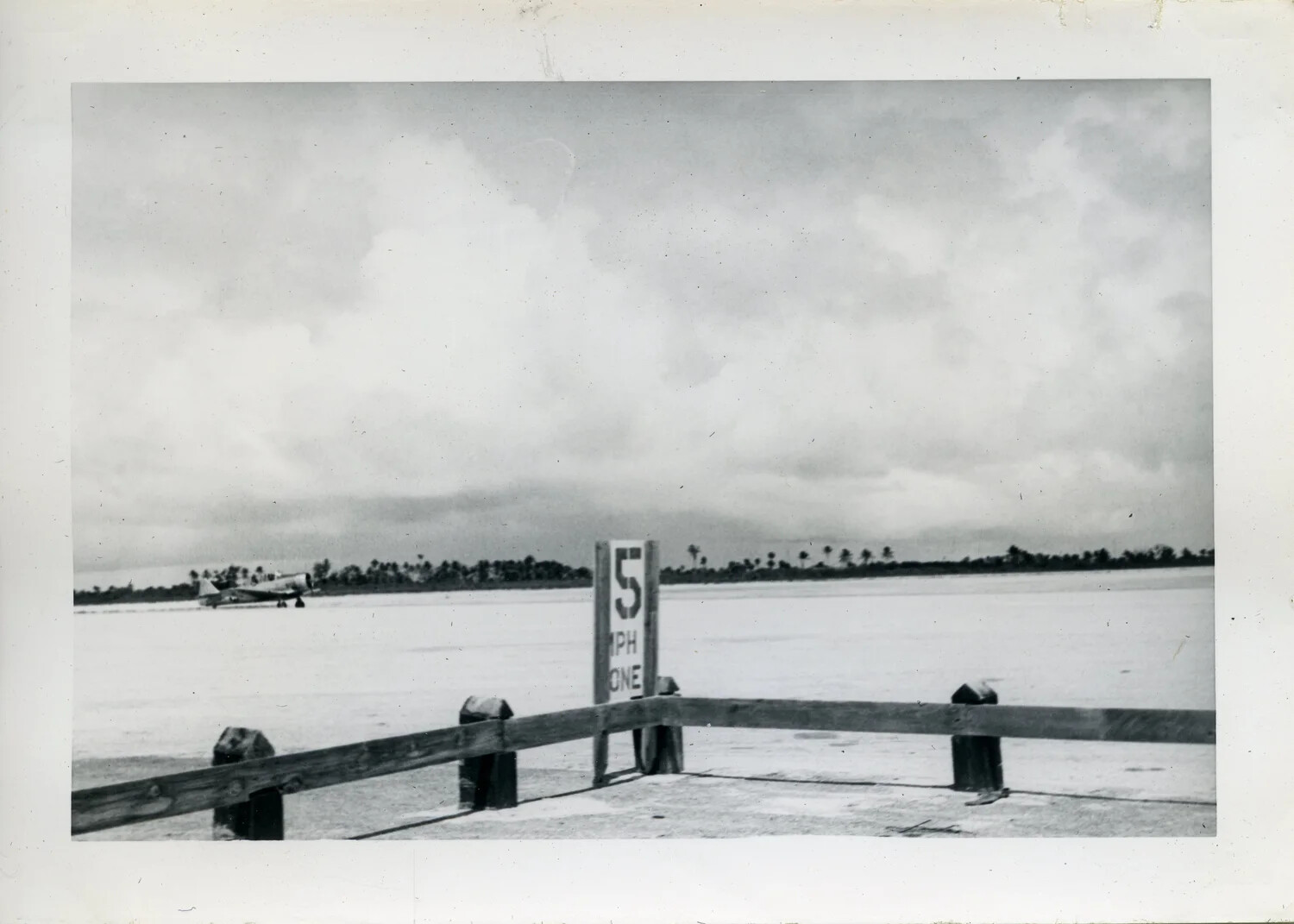 Airfield Ramp View with Speed Limit Sign and Aircraft, NAS Agana, Guam