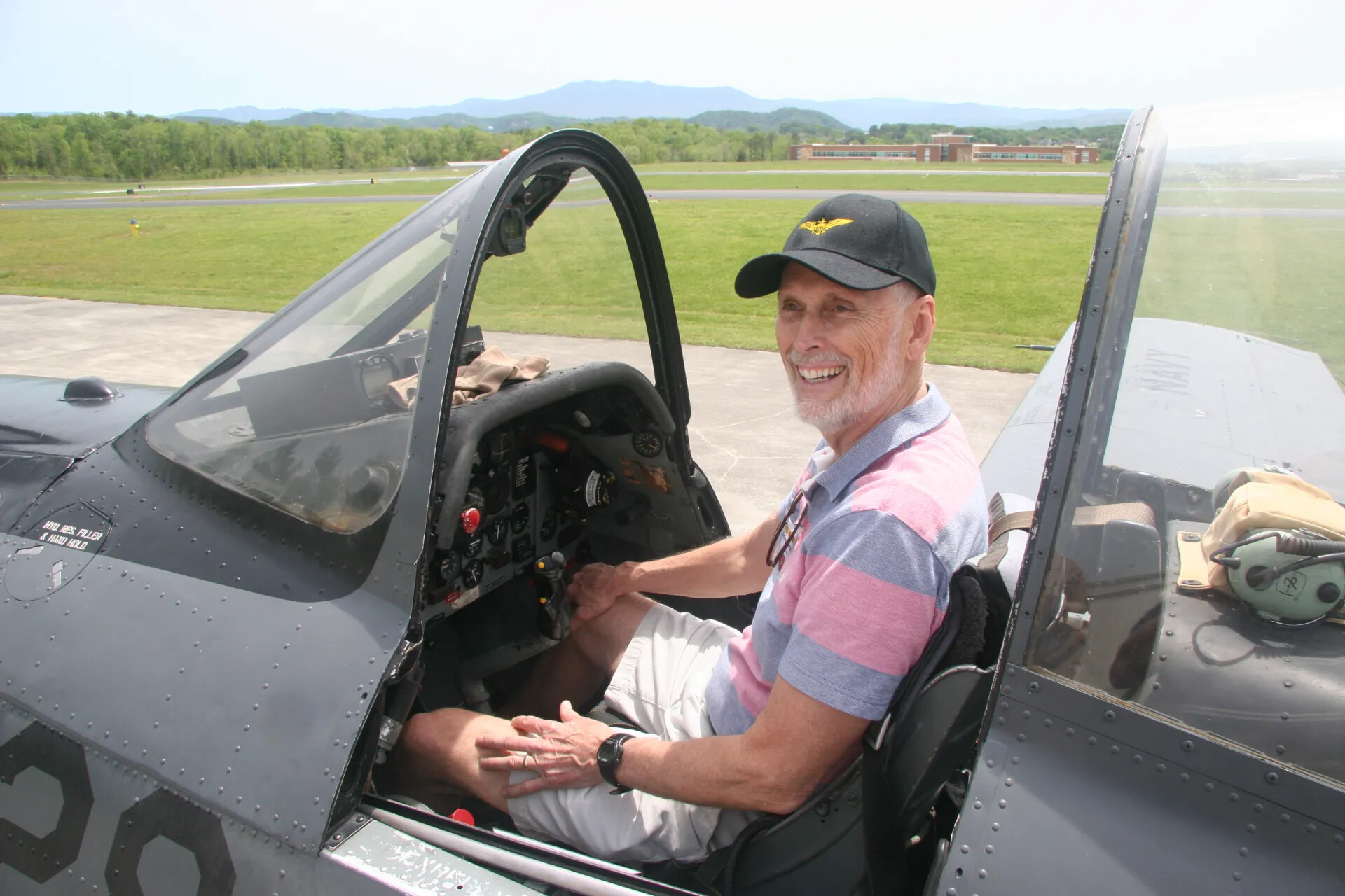 Visitor Seated in Warbird Cockpit at Reunion Event, 2016