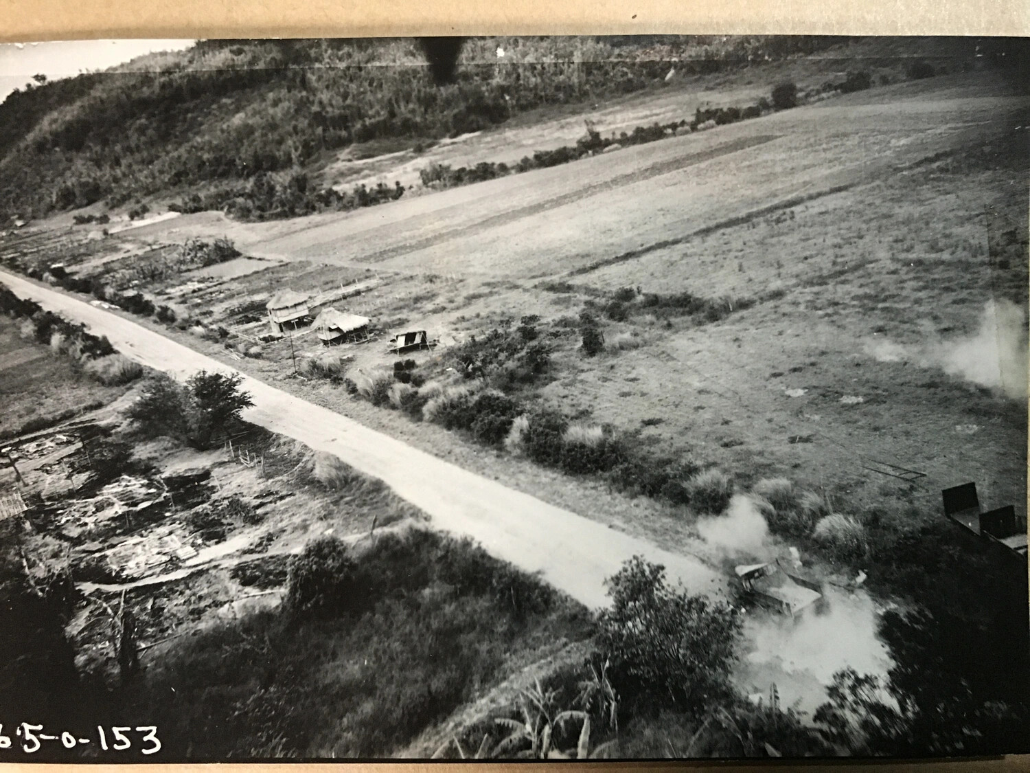 Aerial Photograph of Rural Valley with Multiple Smoke Plumes, Philippines - 312th Bomb Group