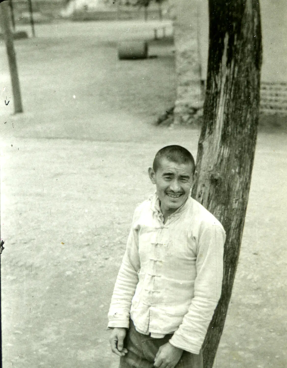 Portrait of a Local Chinese Man Beside a Tree, China-Burma-India Theater, WWII Era