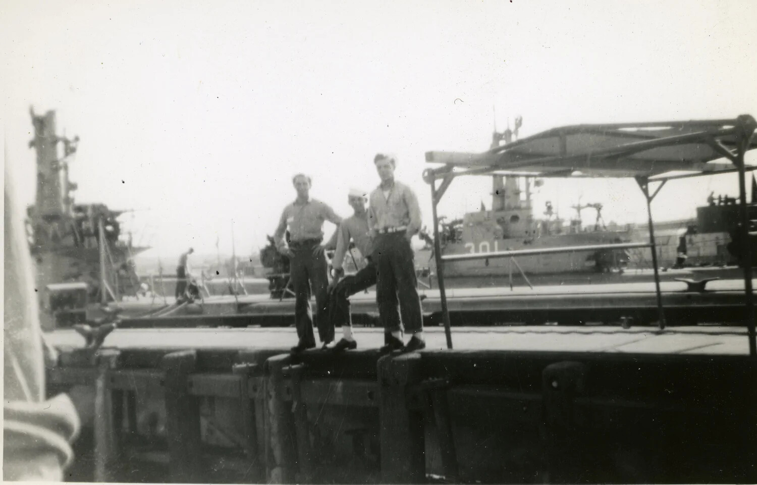 USS Charr (SS-328) — Sailors Posed on the Submarine's Deck at a Naval Pier