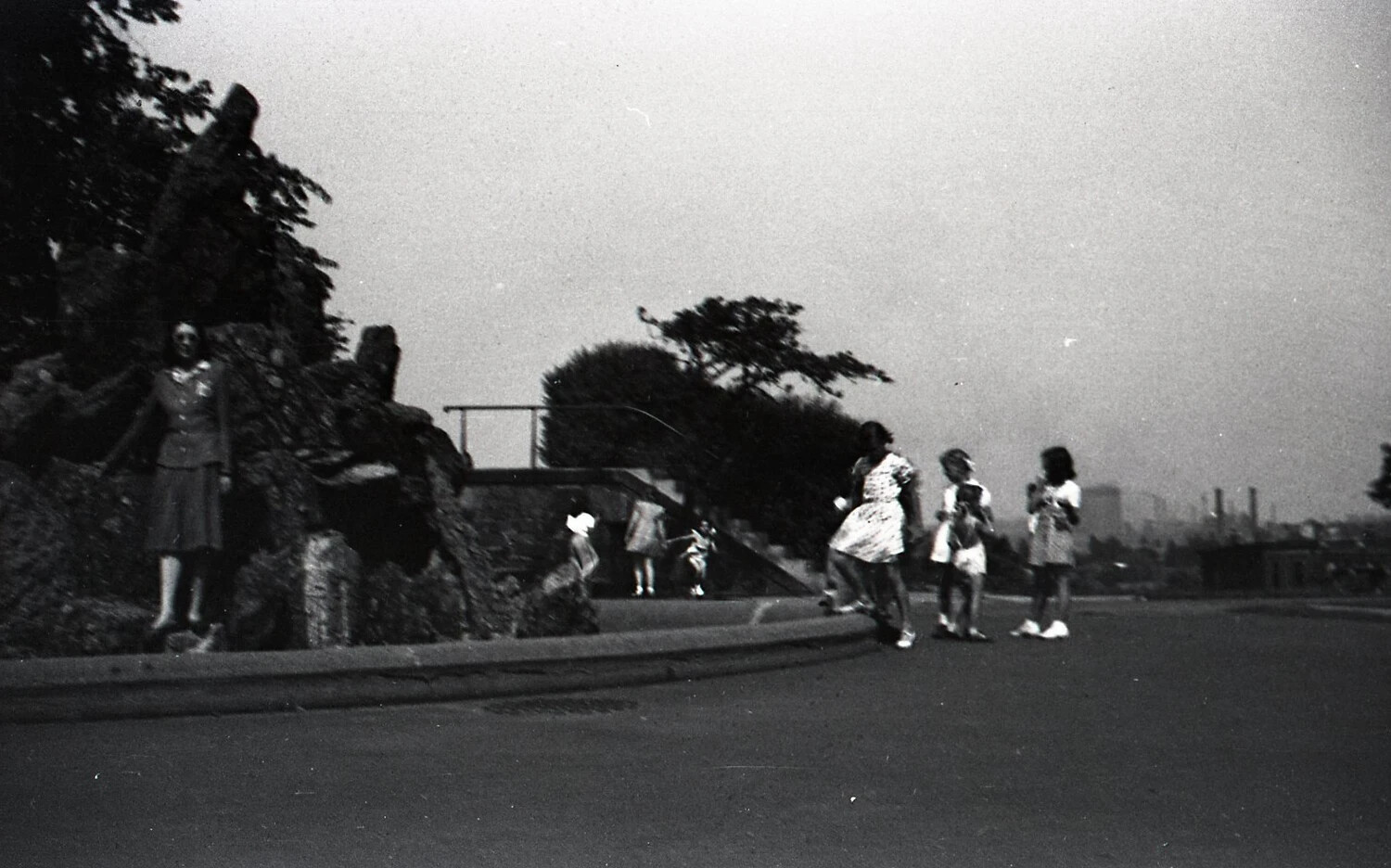 Woman and Children at Urban Park Rock Garden, Wide View, Dusk, c. 1940s
