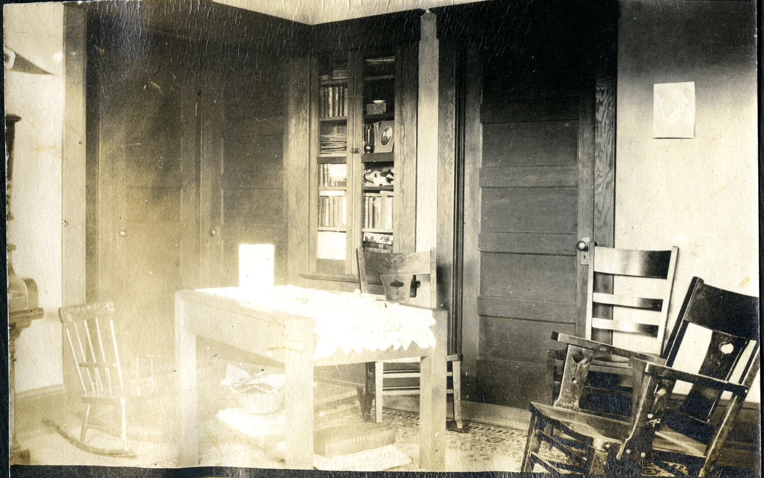 Farmhouse Sitting Room Interior with Bookcase and Rocking Chairs, c. 1917-1919