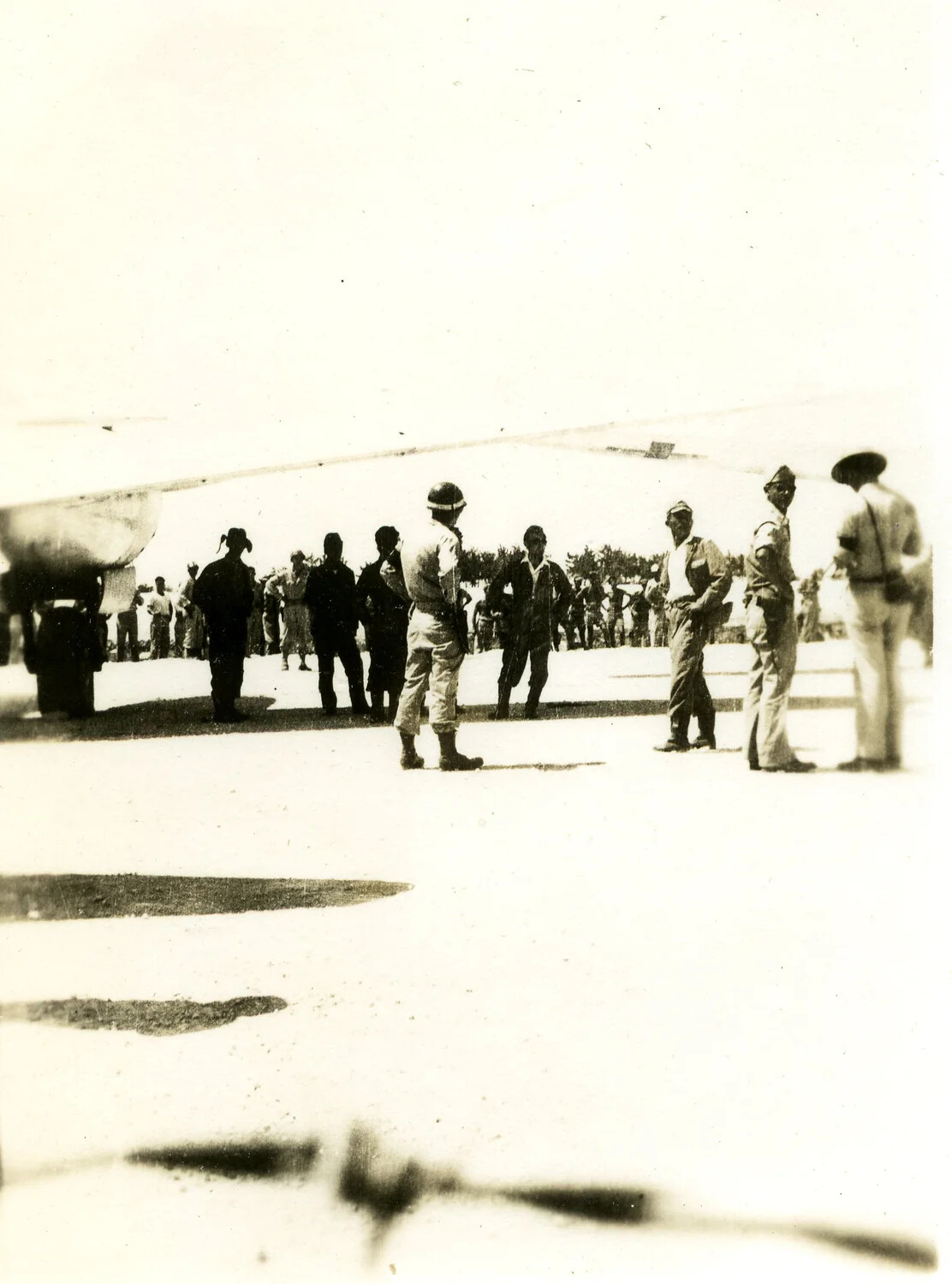 American Officers and Guards Gathered on the Flight Line, Ie Shima, 19 August 1945