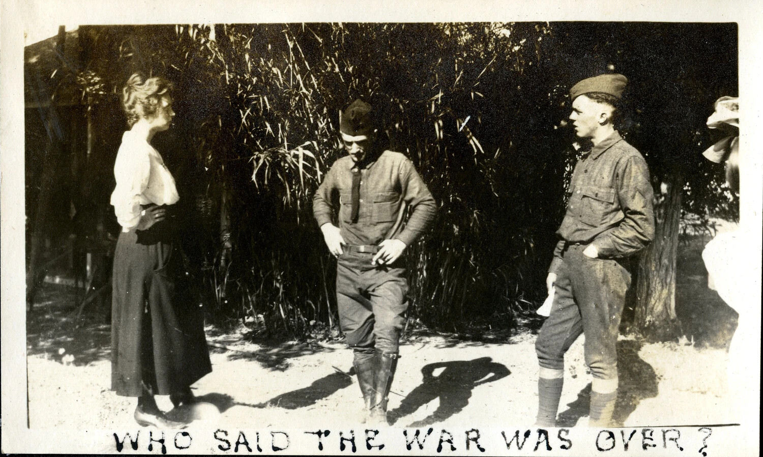 "Who Said the War Was Over?" - Woman and Two Soldiers, WWI-Era Photo Album, c. 1917-1918