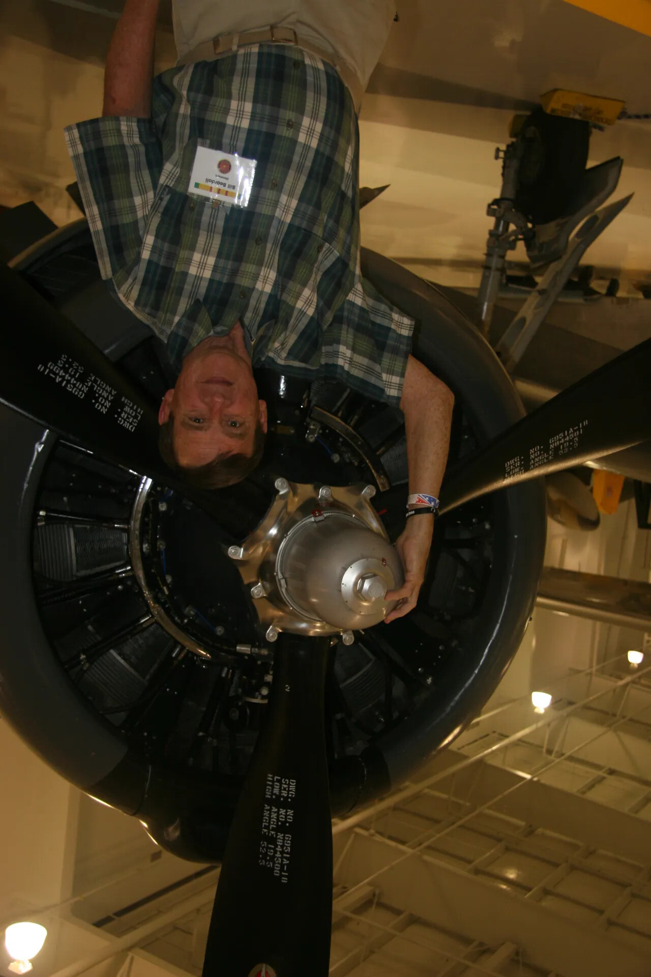 Museum Visitor Posing with Radial Engine Propeller Assembly, Aviation Museum (Variant View)