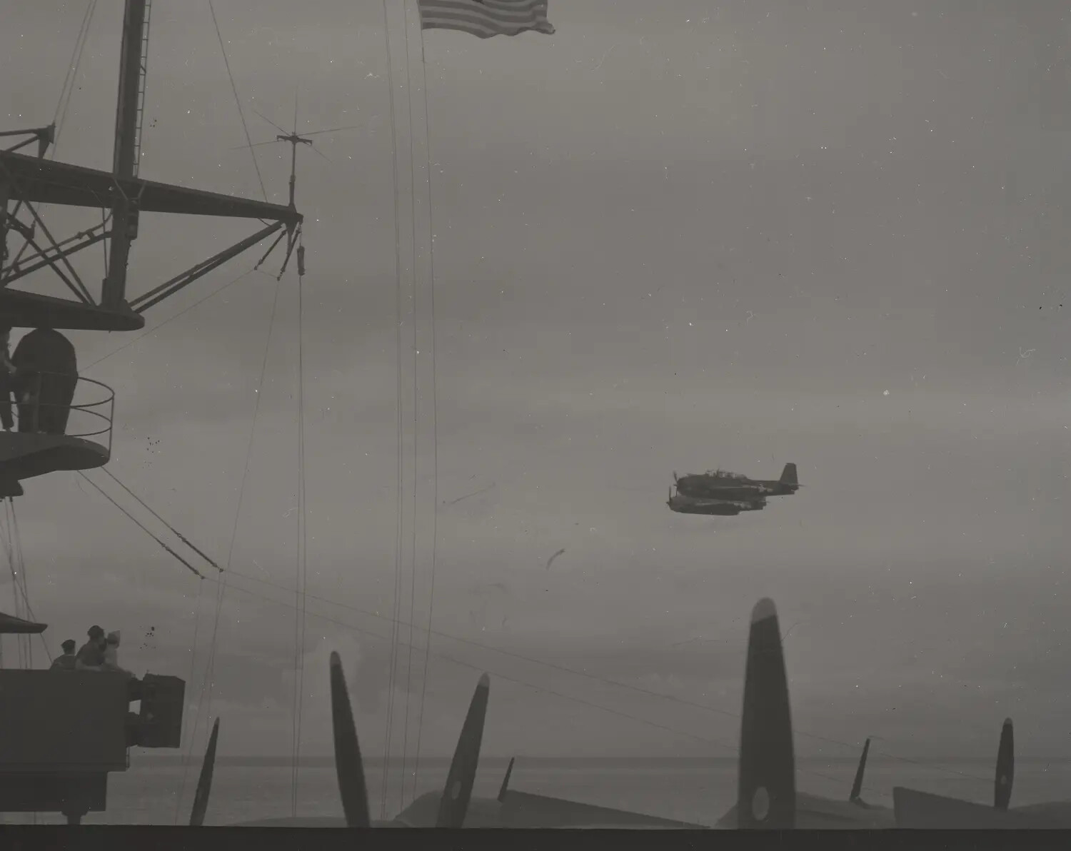 TBM/TBF Avenger in Flight Past USS Petrof Bay's Island, World War II