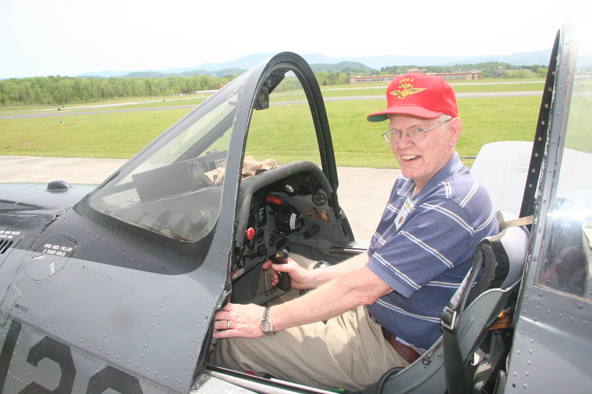 Veteran Posing in Preserved A-1 Skyraider Cockpit, Tailwind Reunion Event, 2016