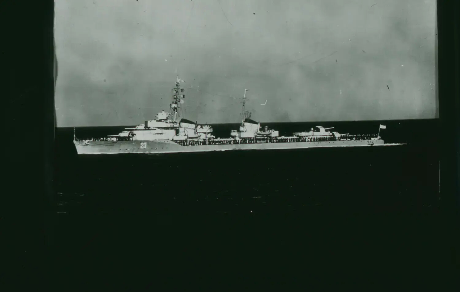 Warship 'No. 23' Underway with Crew Manning the Rails (Copy Photograph)