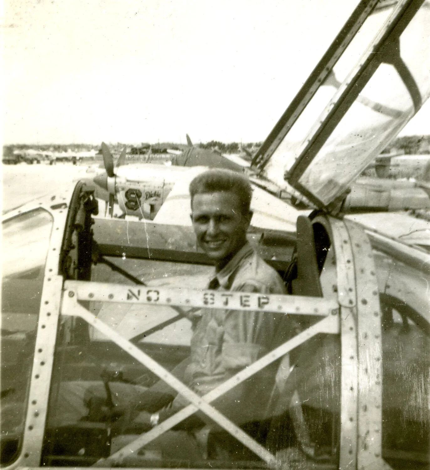 Airman on Wing of B-25 Mitchell Bomber, Ie Shima, 345th Bombardment Group, 1945