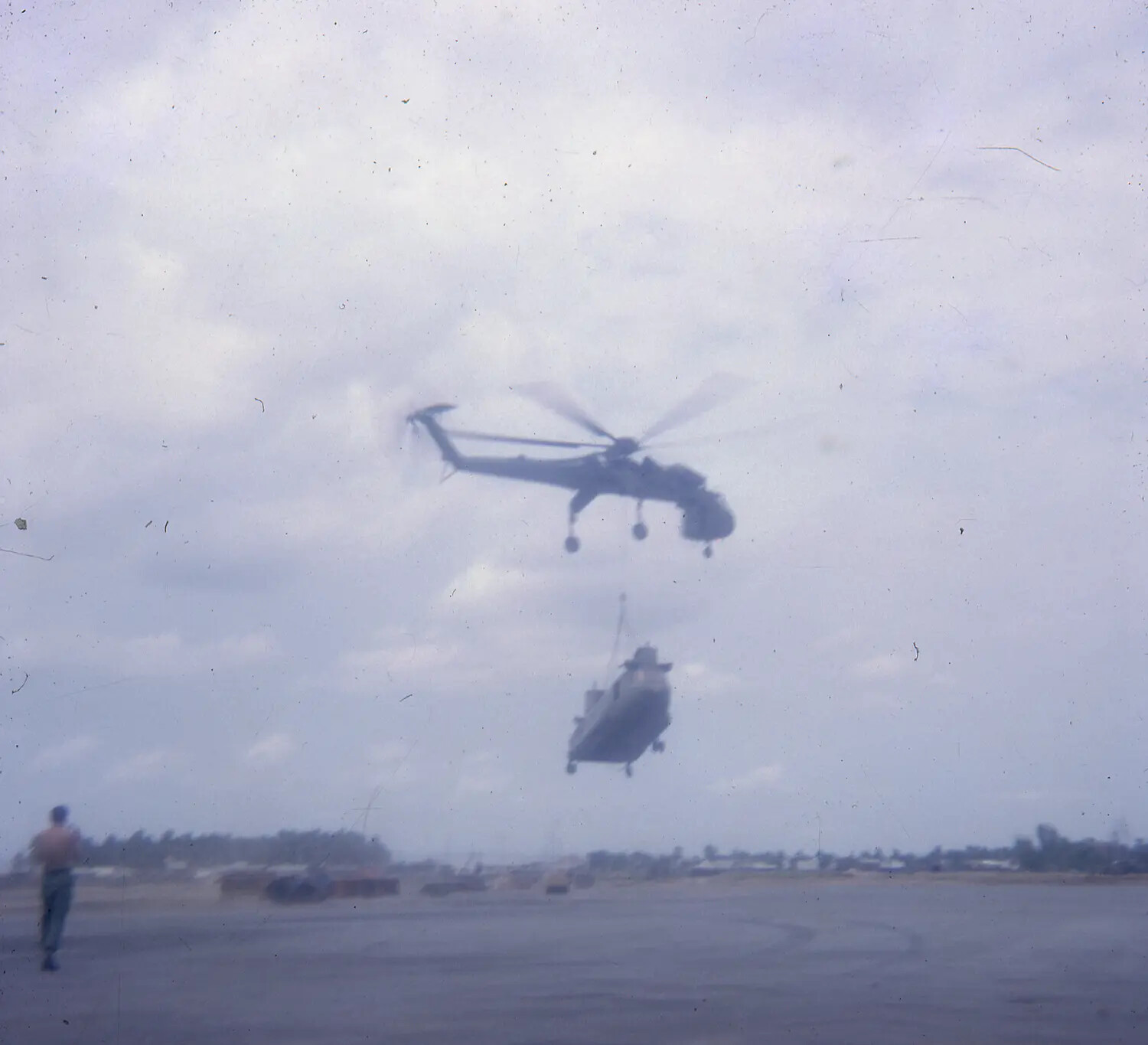 Heavy-Lift Helicopter Airlifting a Slung Airframe, Vietnam War Era