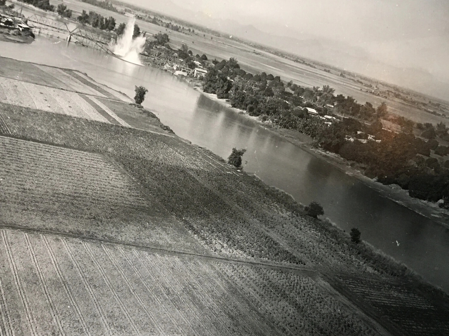 Aerial Strike Photo - Bomb Burst Near River Bridge, 312th Bomb Group