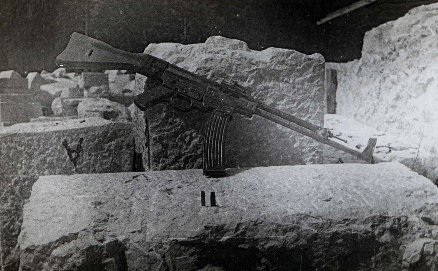 Captured German StG 44 Assault Rifle Displayed on Stone Rubble, WWII European Theater