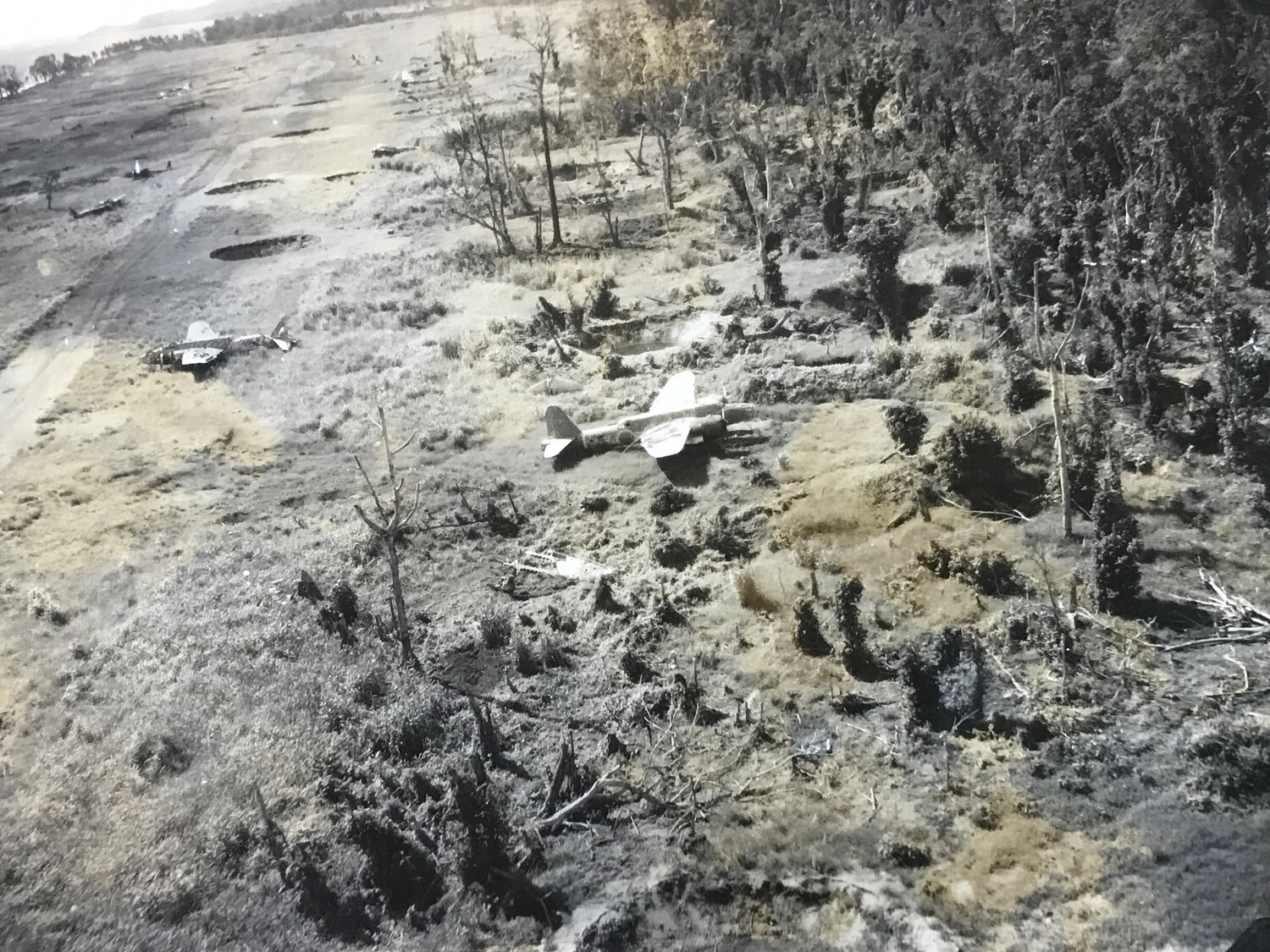 Wrecked Japanese Aircraft on Wewak Airfield, New Guinea
