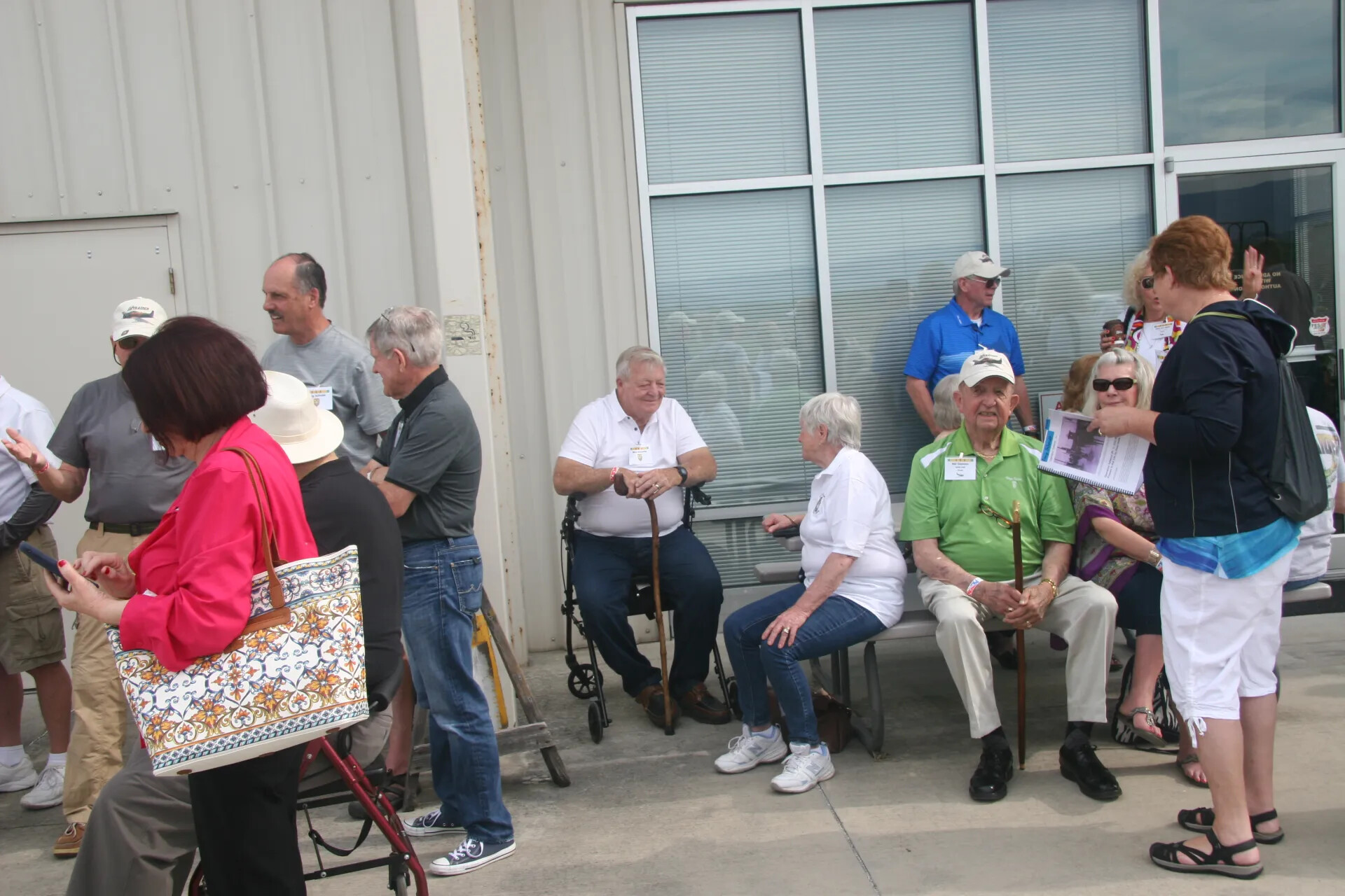 Veterans and Attendees Socialize Outside Museum Building, Operation Tailwind Commemorative Event, 2016