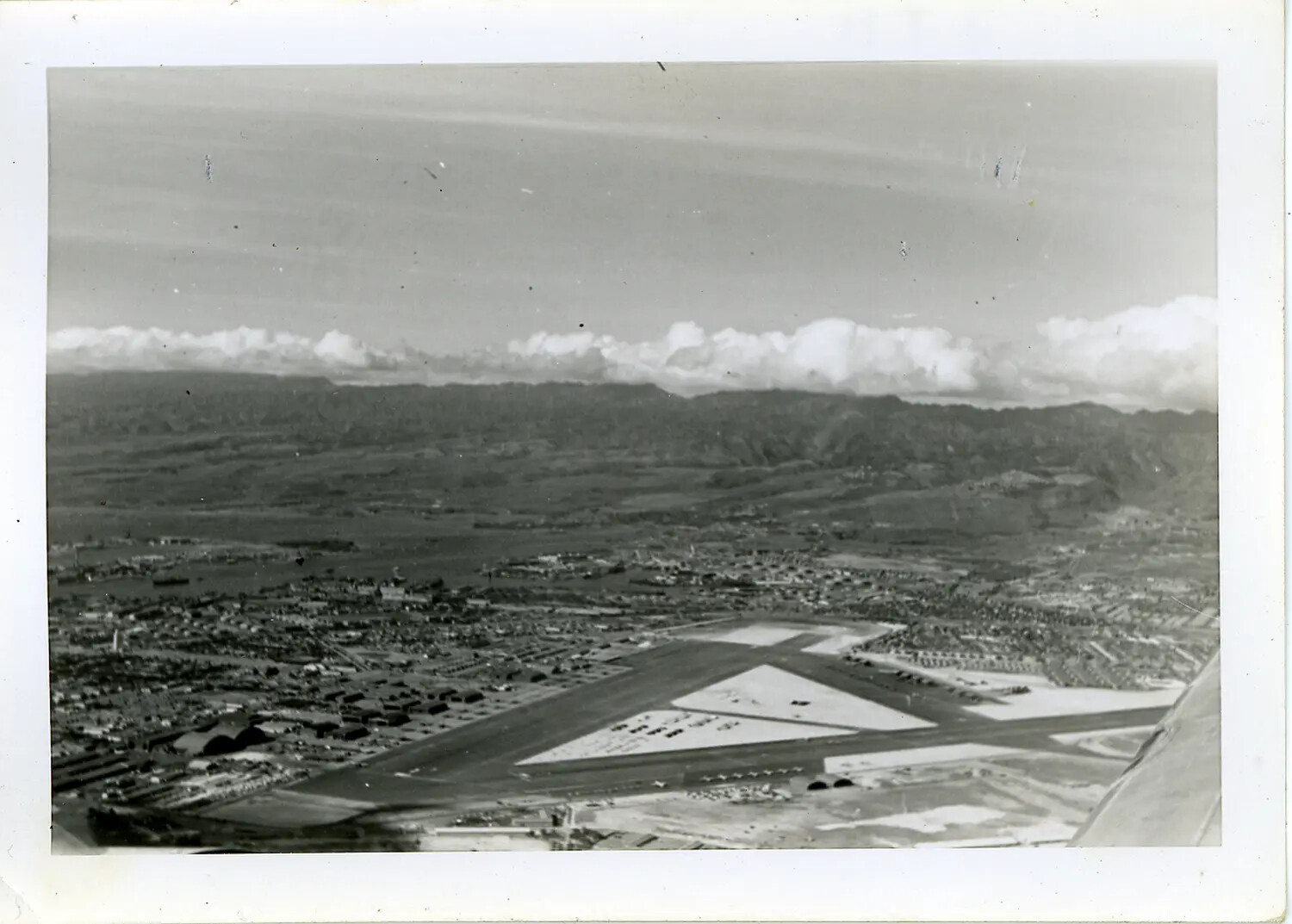 Aerial View of a Hawaiian Military Airfield with Triangular Runway Layout — WWII Era, Oahu