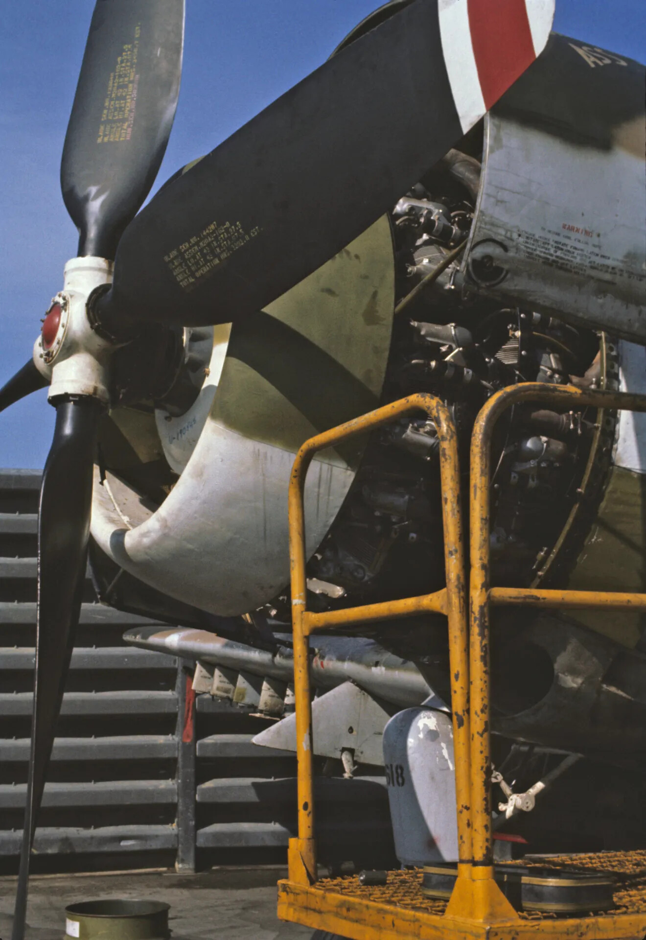 Close-Up of A-1 Skyraider Engine Cowling, Propeller, and Ordnance During Maintenance, Don Engebretsen Slide Collection