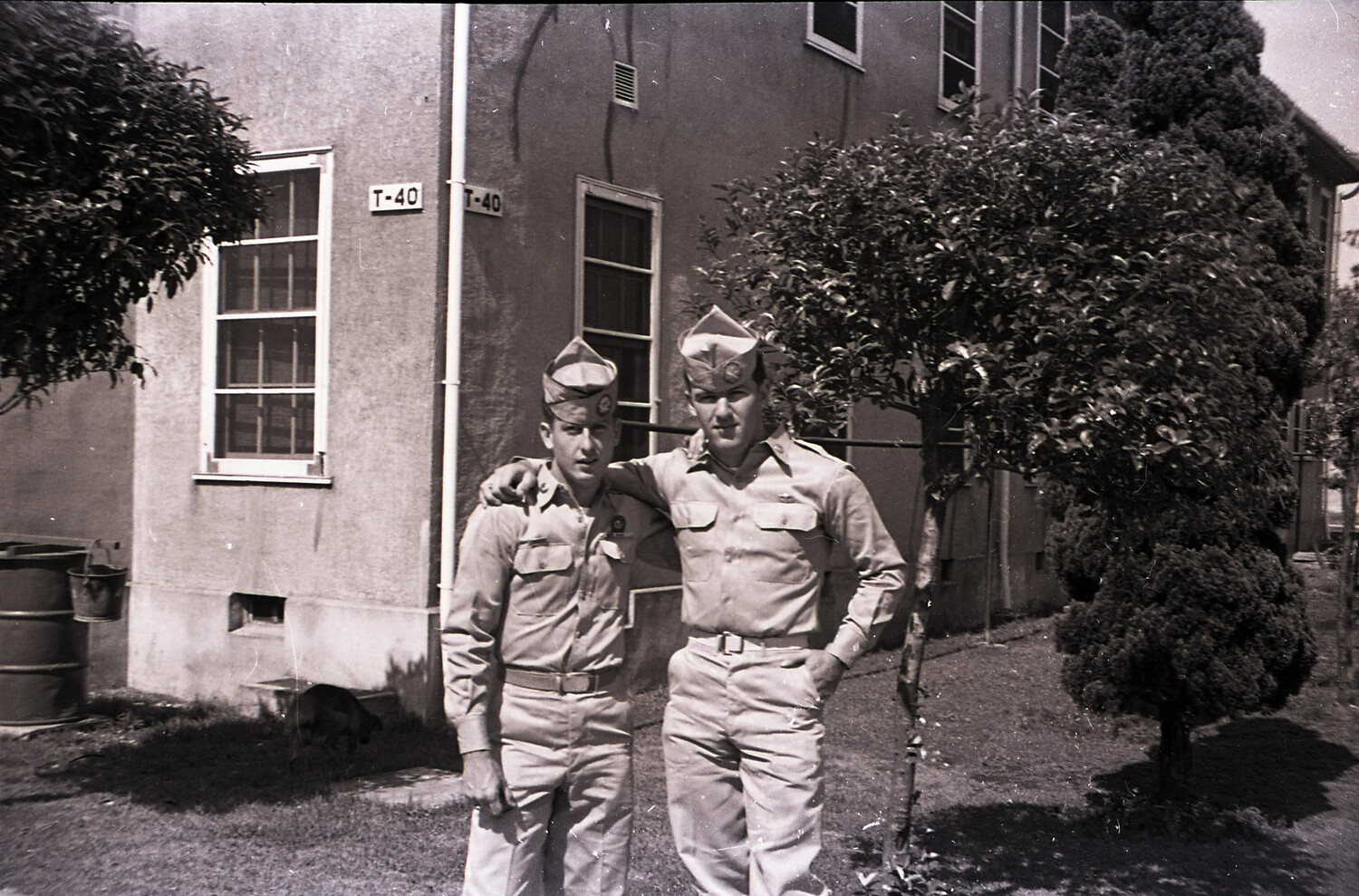 Two Soldiers of the 187th Airborne Regimental Combat Team at Barracks Building T-40