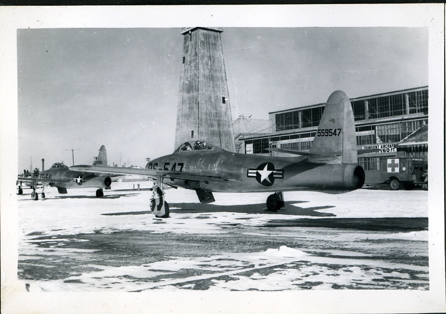 Lockheed T-33A Shooting Star Jet Trainers on Snowy Ramp, U.S. Air Force Base