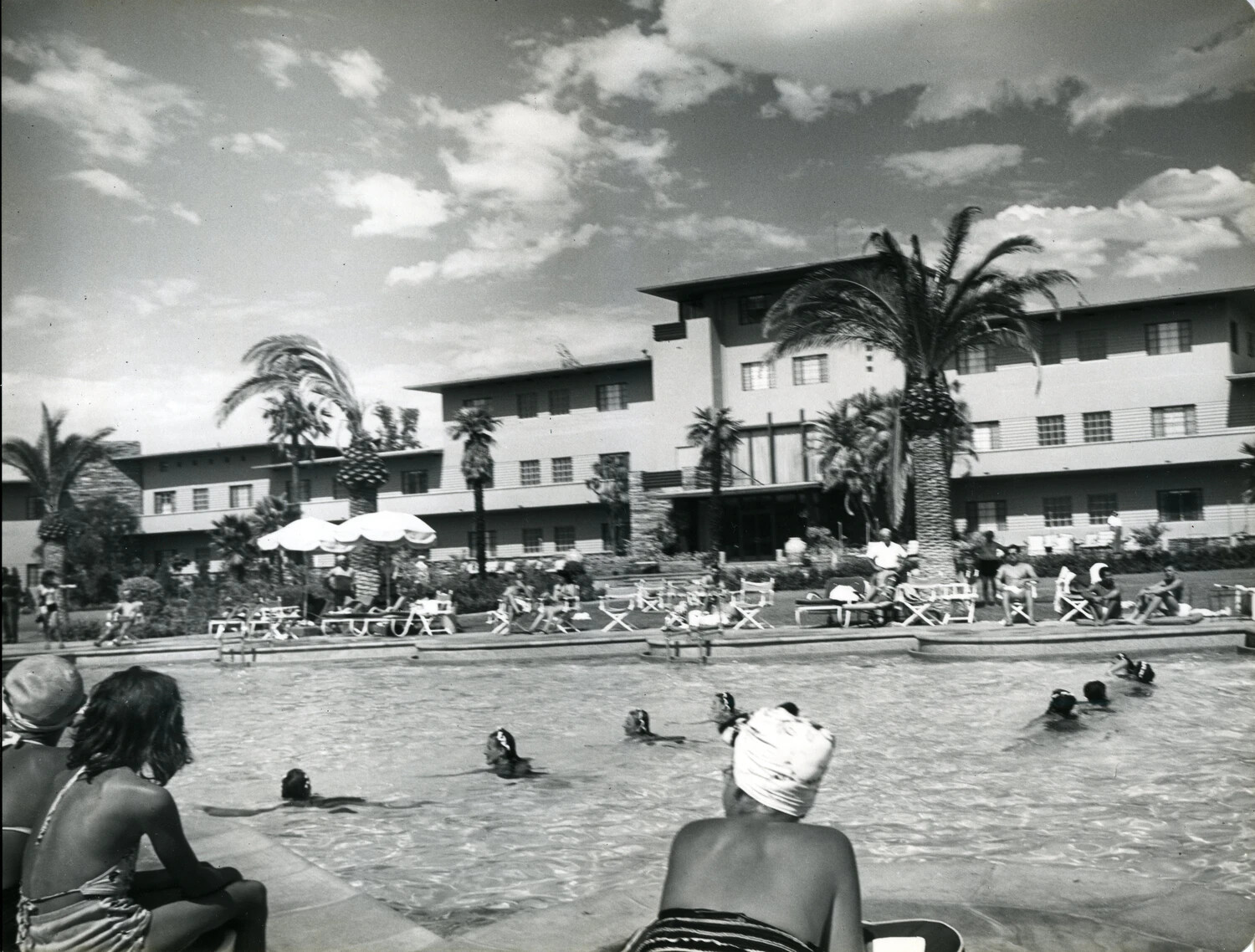 Swimmers and Resort Hotel Building, Poolside View, c. 1949