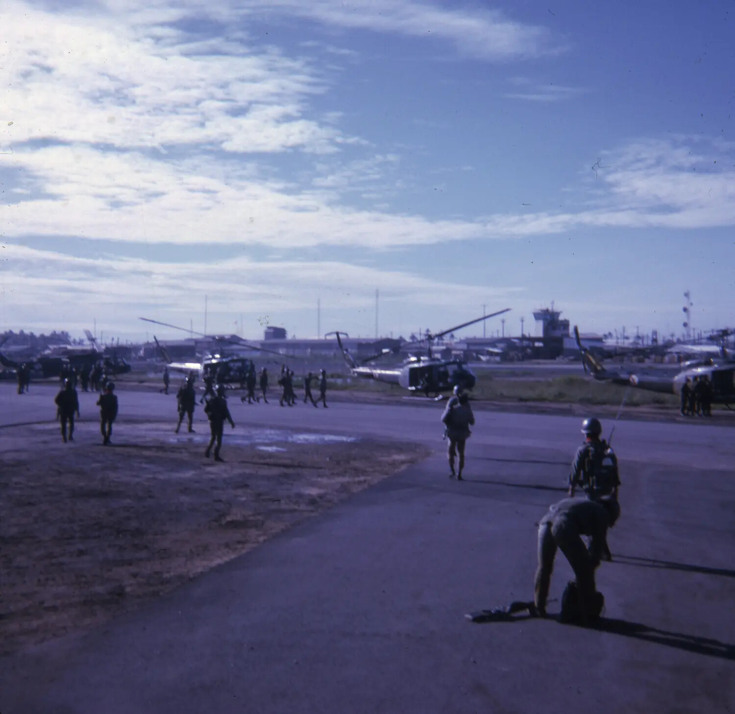 UH-1 Huey Helicopters on Airfield Ramp, Vietnam