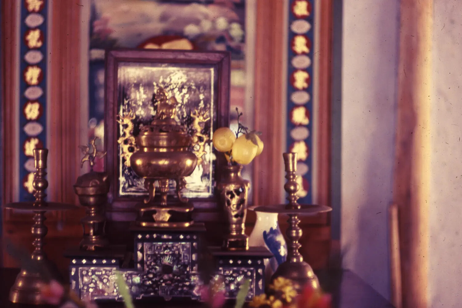 Traditional Vietnamese Ancestral Altar with Brass Incense Burner and Lacquerware, Vietnam War Era