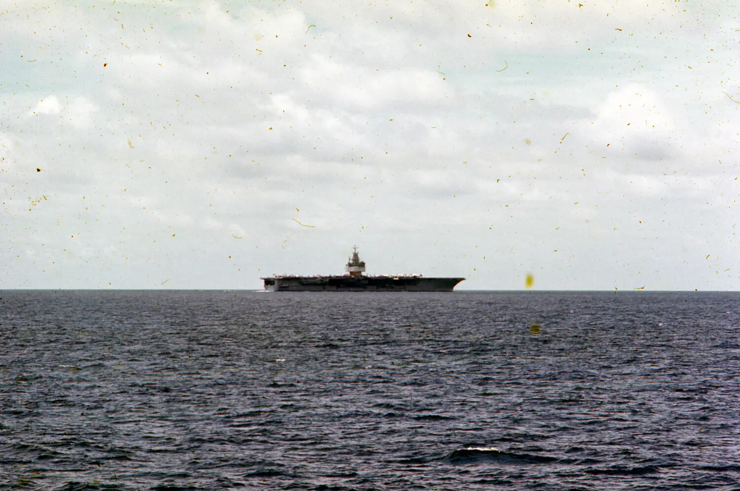 USS Ticonderoga Underway, Broadside View with Aircraft on Deck