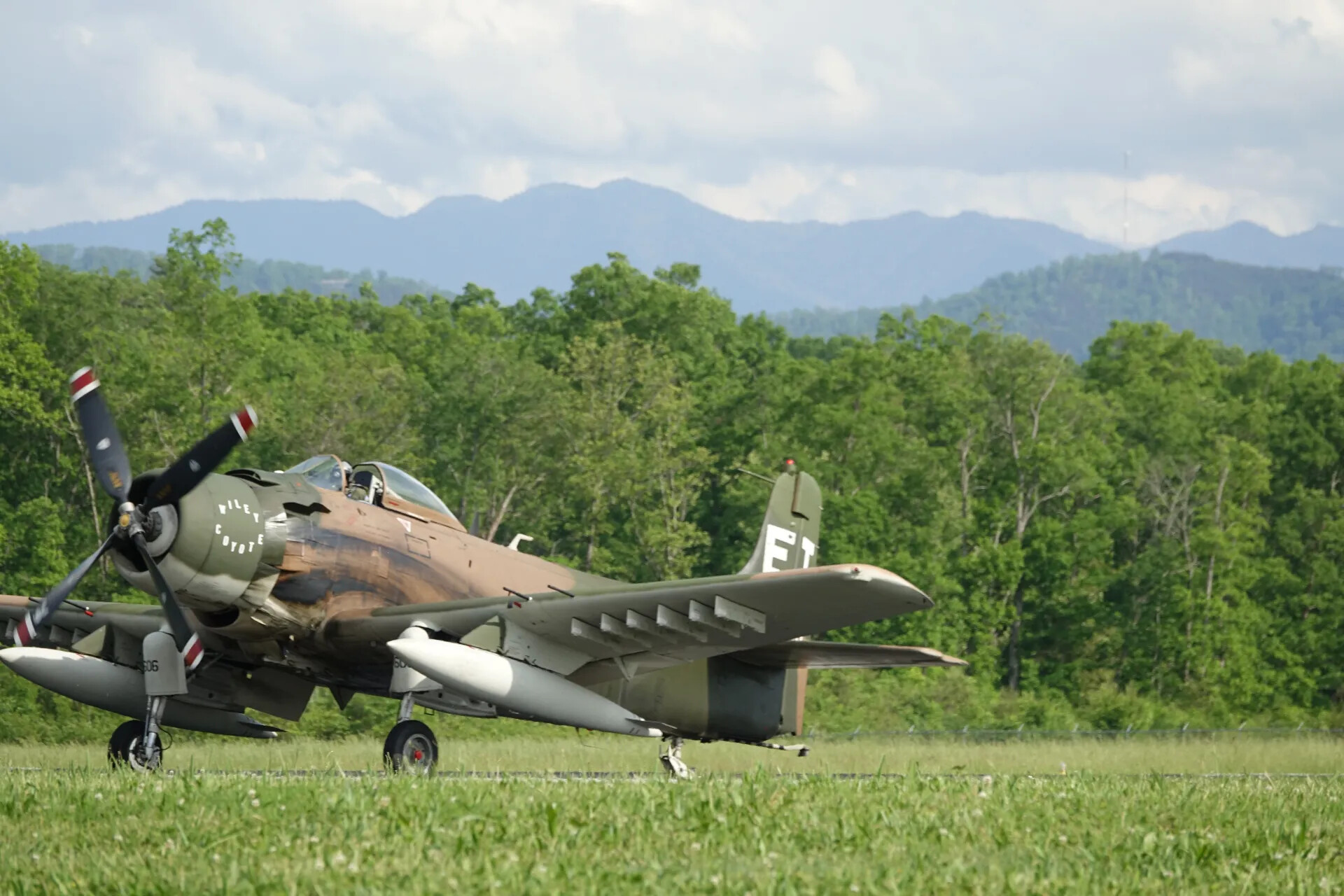 A-1 Skyraider 'Wiley Coyote' Taxiing with Mountain Backdrop, May 2019 Airshow Event
