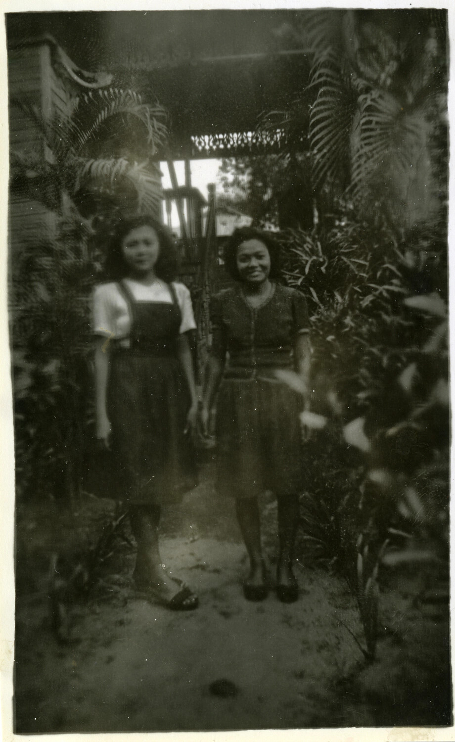 Two Local Women in a Garden Setting, Pacific Theater, World War II Era
