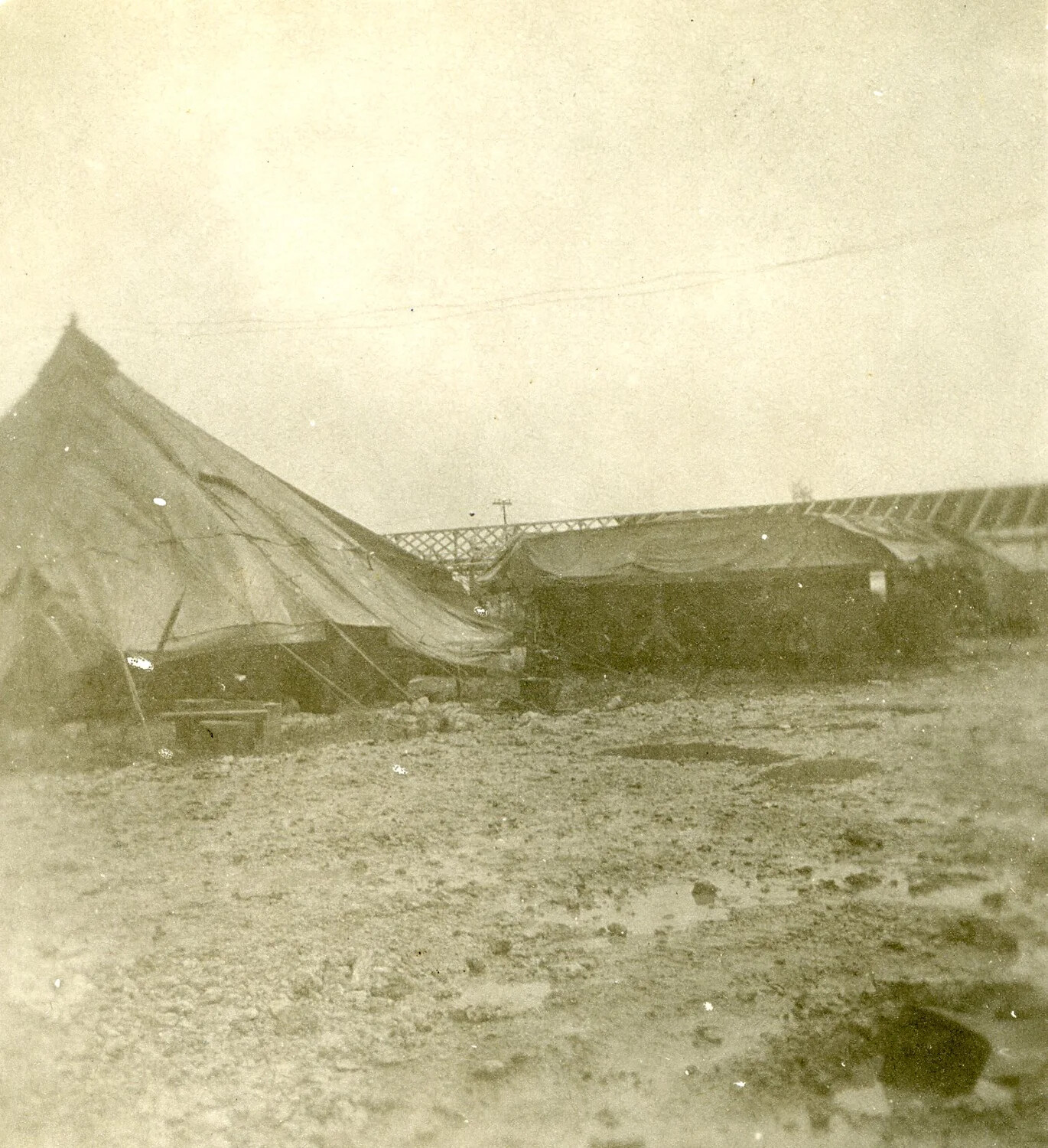 Leaning Tent and Muddy Camp Ground, Ie Shima, WWII Photo Album