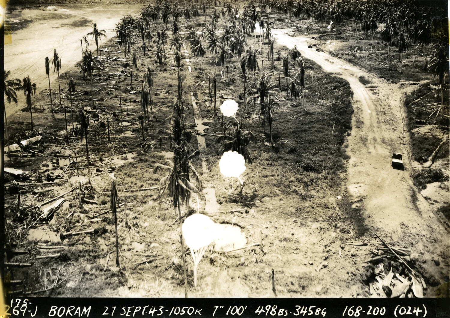 Strike Photo, Boram Airfield, New Guinea, 498th Bomb Squadron, 345th Bomb Group, 27 September 1943