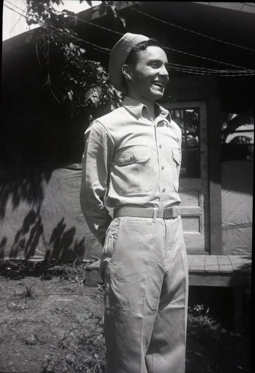 Serviceman in Khaki Utility Uniform at Base Camp, Kelley Album