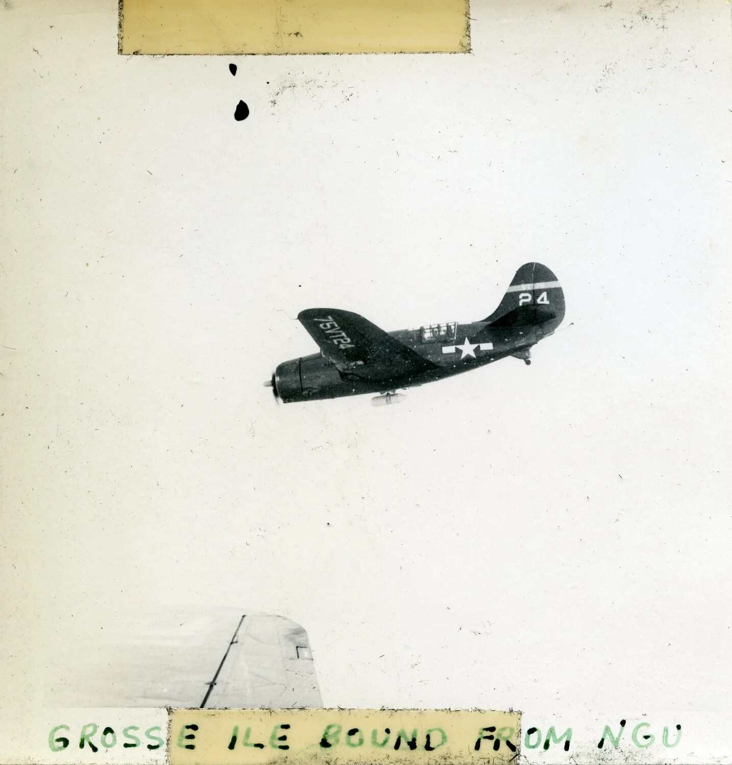 US Navy Single-Engine Aircraft in Flight, Tail Code 'P4', Route Grosse Ile to NGU, Scrapbook Photograph