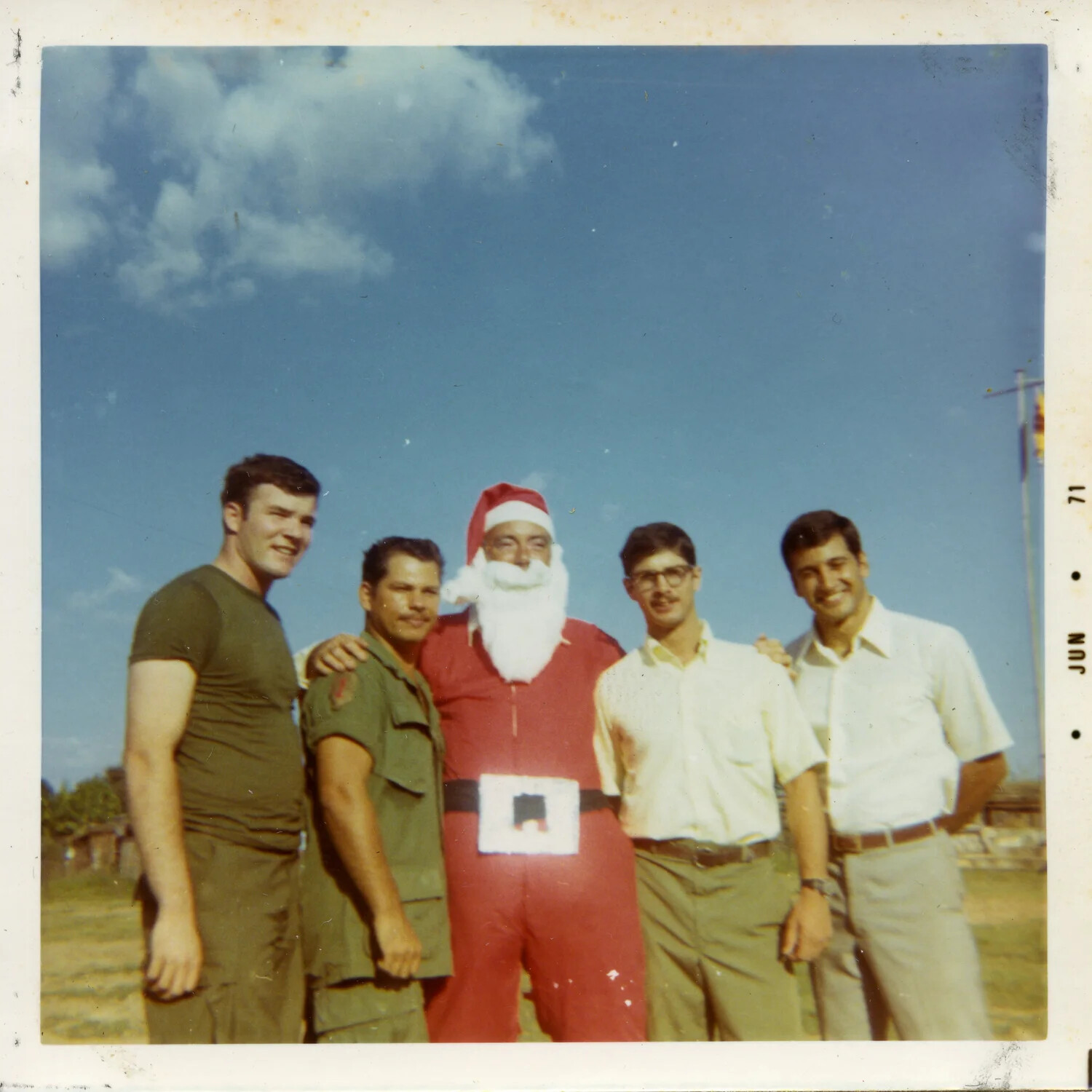 Five Servicemen with 'Santa Claus' at a Vietnam Base, 1971