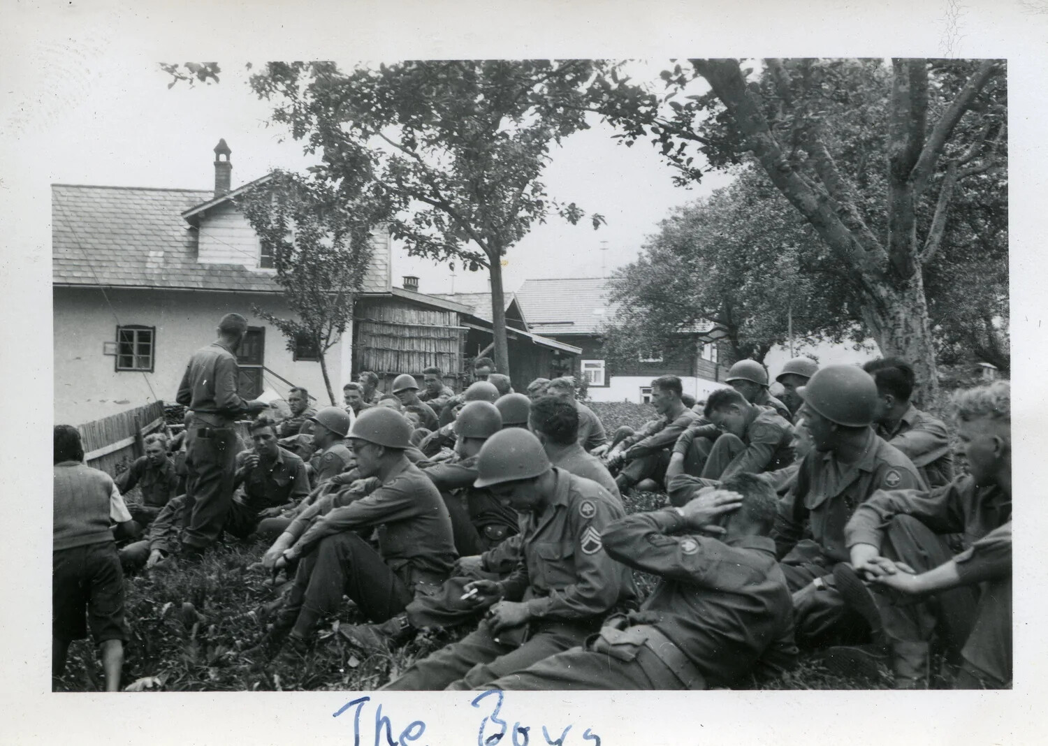 Soldiers of the 44th Infantry Division at Rest in a European Village, WWII (Norman Baget Album)