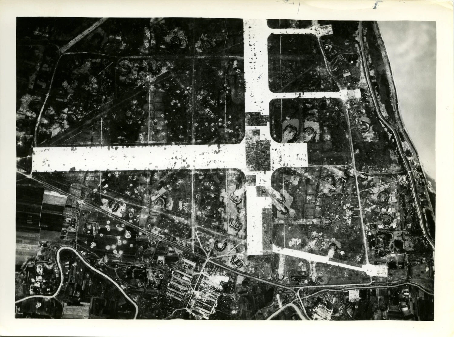 Vertical Aerial Reconnaissance Photograph of Airfield with Revetments and Bomb Craters, CBI Theater, WWII