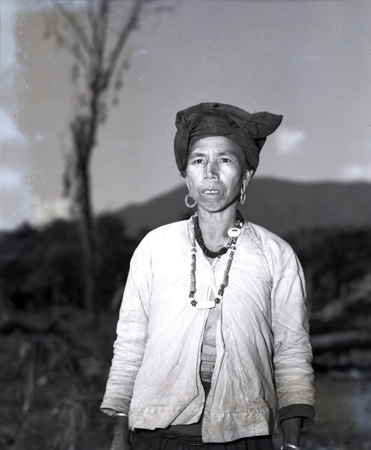 Portrait of a Hill-Tribe Woman in Traditional Dress and Jewelry, Burma-China Border Region, WWII Era