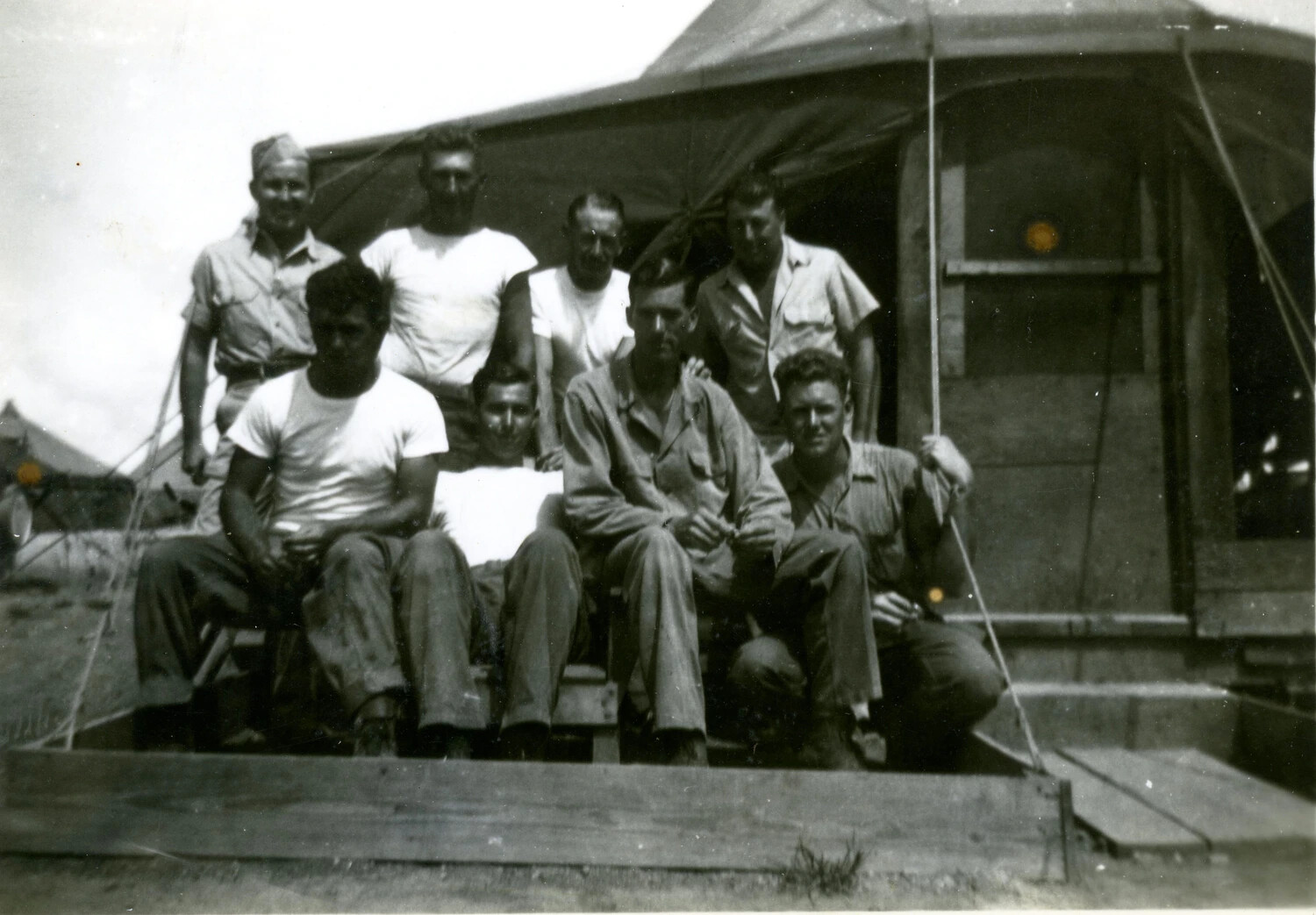 Nine U.S. Marines on Tent Platform Deck (Adjusted Print), 5th Marine Division, Pacific Theater, 1945