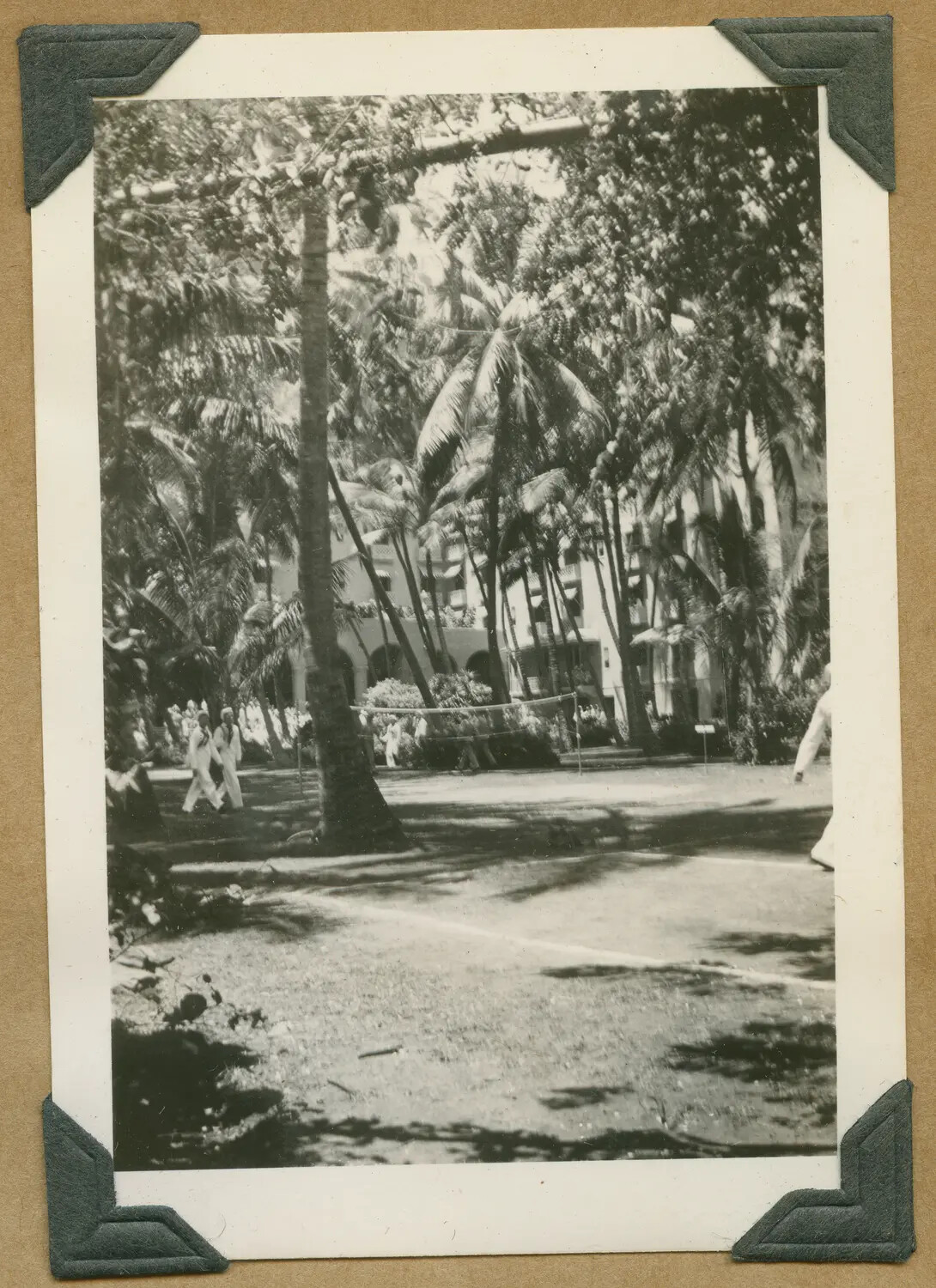 Servicemen in White Uniforms at a Tropical Hotel Courtyard, Hawaii
