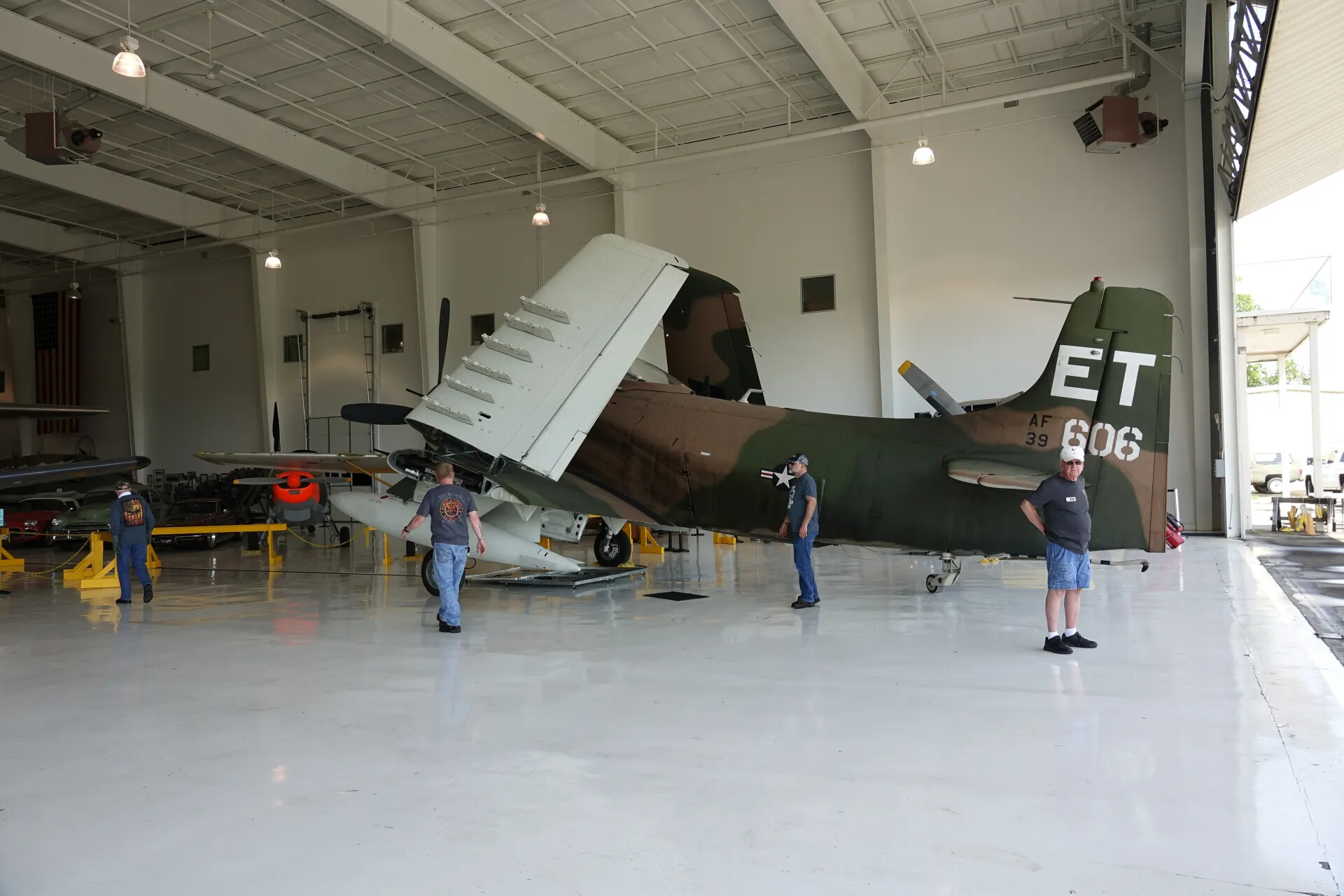A-1 Skyraider (Tail Code ET, S/N AF 39-606) on Display with Visitors, Museum Event, May 3-4, 2019