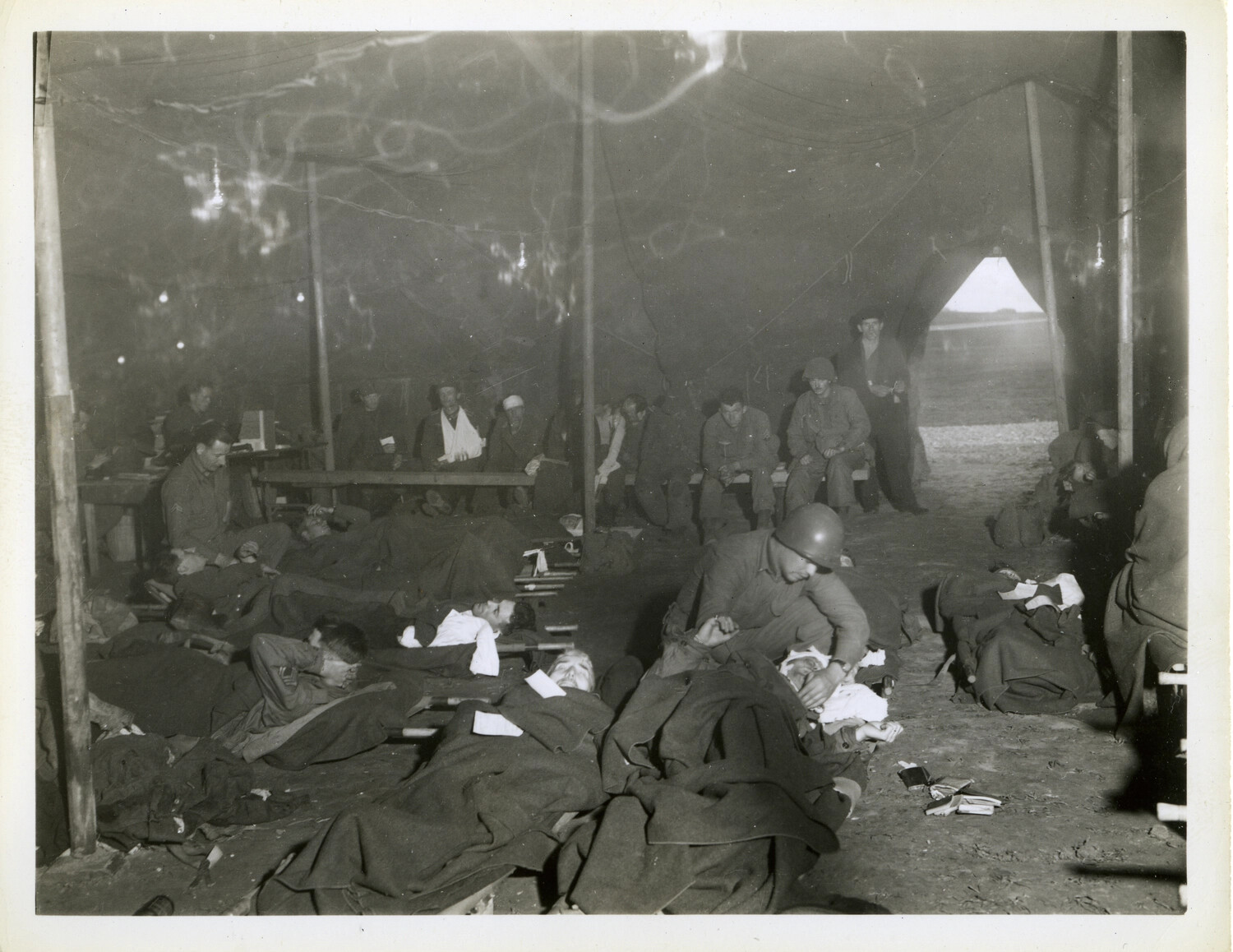 Wounded Soldiers Awaiting Treatment in Field Hospital Receiving Tent