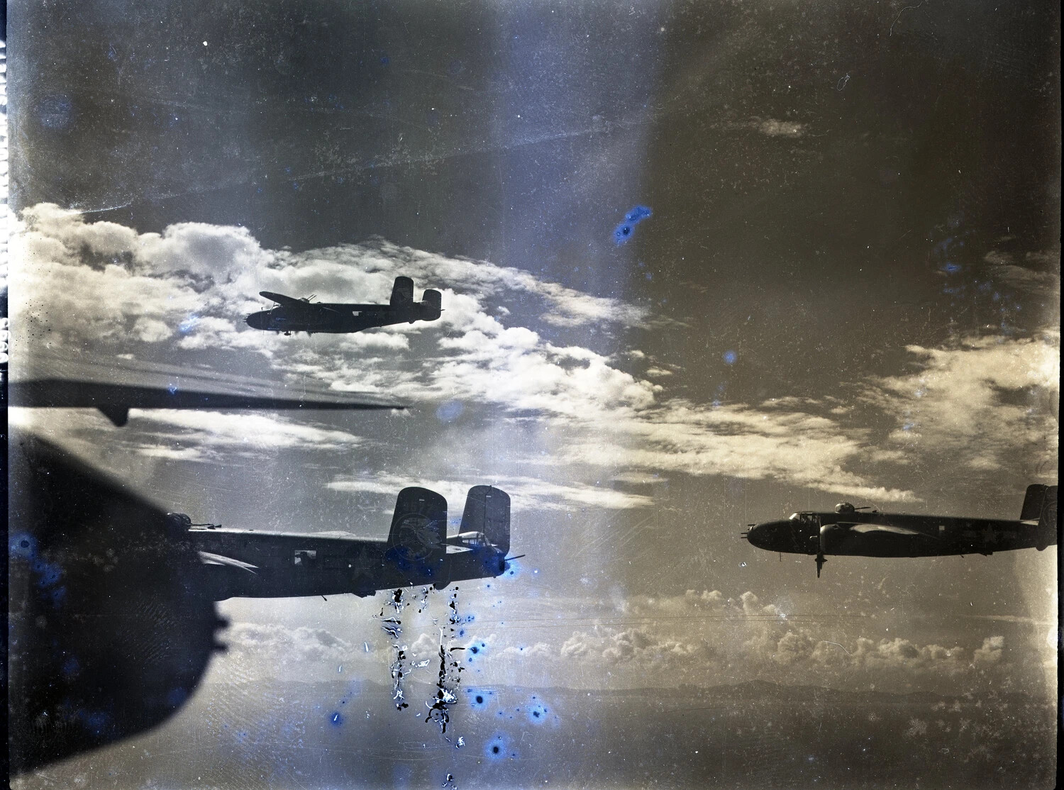 B-25 Mitchell Bombers in Combat Formation with Bombs Falling, 345th Bombardment Group, WWII Pacific Theater