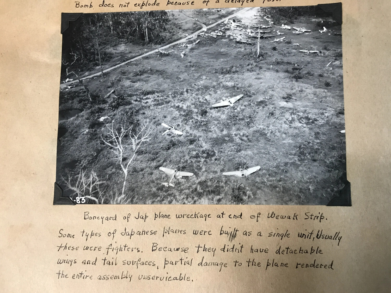 Boneyard of Japanese Plane Wreckage, Wewak Strip — Annotated Album Photograph