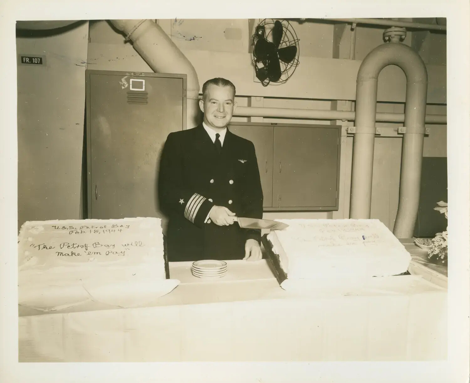 Commissioning Cake-Cutting Ceremony Aboard USS Petrof Bay (CVE-80), 18 February 1944