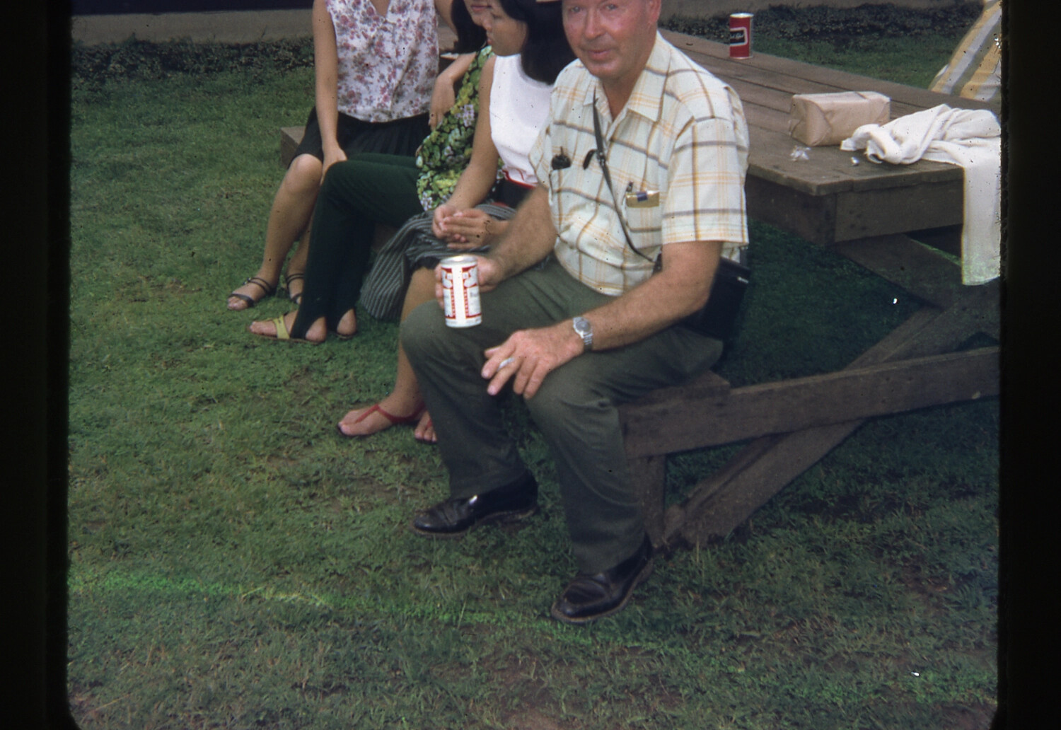 American Man with Beverage Can at Outdoor Picnic Gathering, Vietnam War Era (35mm Slide)