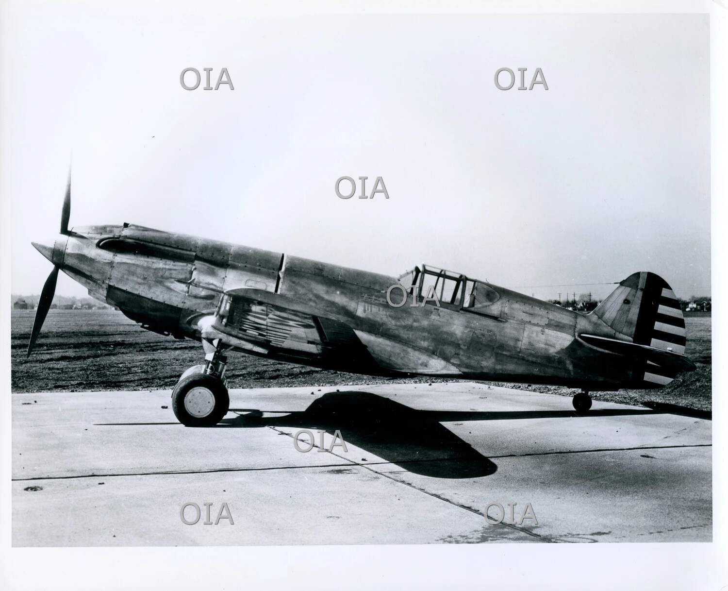 Curtiss YP-37 Pre-Production Pursuit Aircraft, Right Profile View on Airfield Ramp